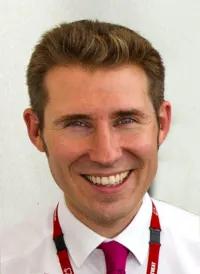 Nick L Mills